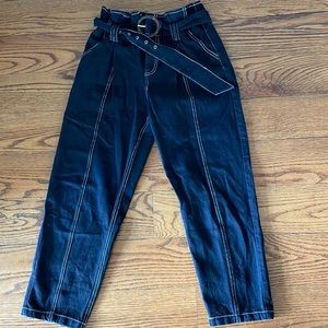 comfortable cargo material pants, loose but baggy fit. with a belt.